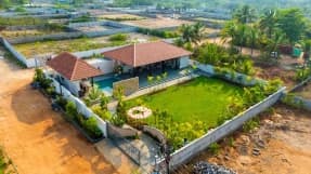 3 BHK farmhouse with a private pool in Shamshabad, Hyderabad (BMF-F569)